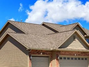 Gray asphalt shingle roof with gable peaks and clean installation lines