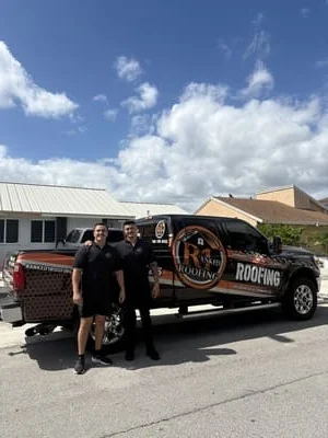 Black service truck with copper and black Ranked-1 Roofing wrap and logo